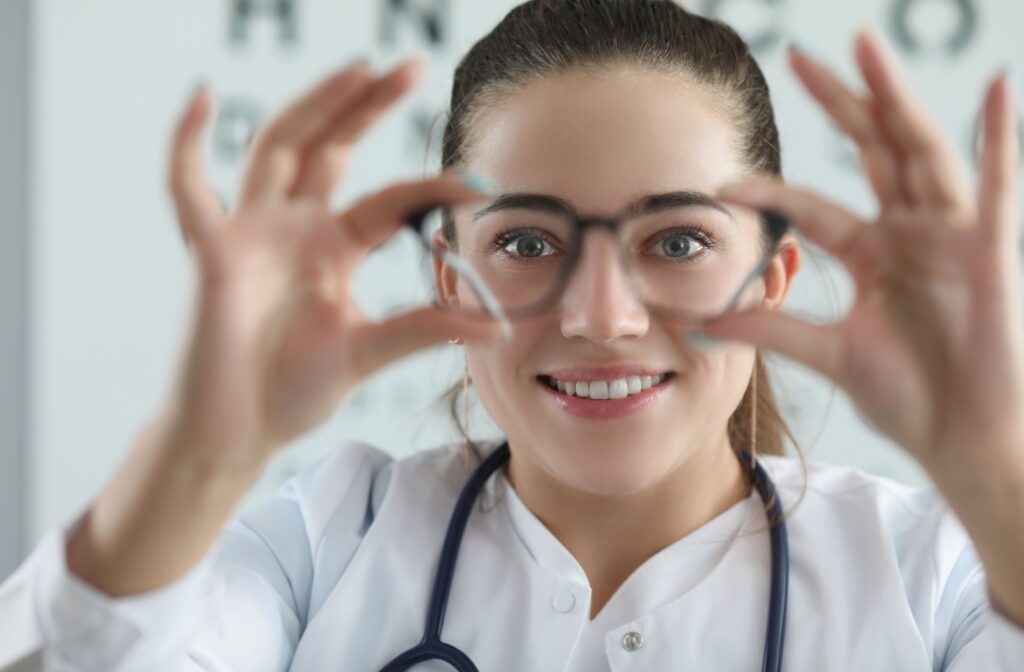 Optometrist performing a comprehensive eye exam on a patient.